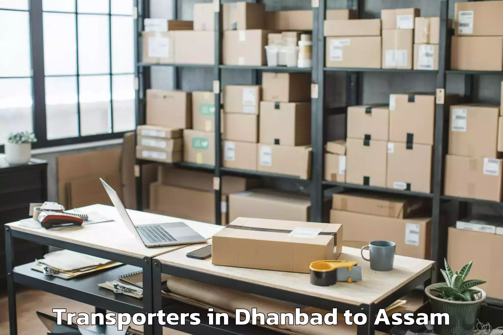 Dhanbad to Silchar Airport Ixs Transporters Booking